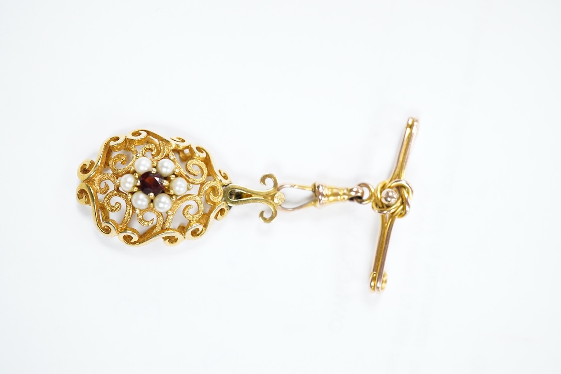 A yellow metal stick pin, the terminal modelled as a Knight's arm holding a scroll(a.f.), 79mm, together with two pairs of yellow metal and gem set ear clips including 9ct and opal doublet.